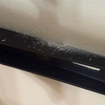 Miracle Services - Wall mount for TV, residual drywall material from drilling holes - Handyman Near Me