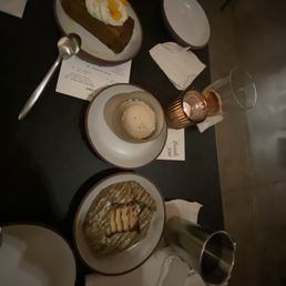 The persimmon pumpkin cake, black sesame apple galette, early grey gelato. The persimmon pumpkin cake, black sesame apple galette, early grey gelato.