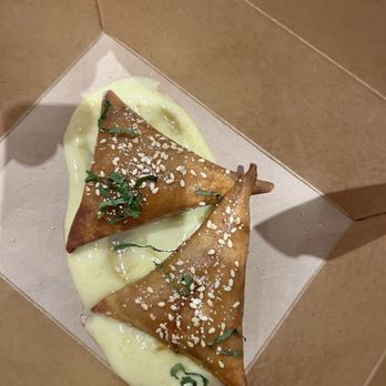 Blue Atlas - Fried almond croissant in orange custard - Tapas/Small Plates Near Me - Richmond, Virginia