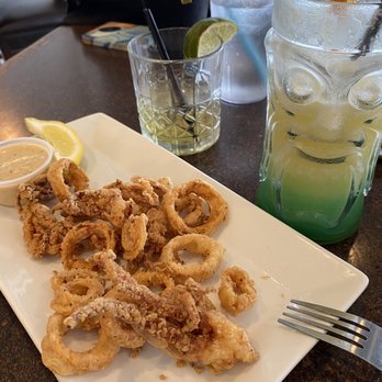 ZZAS - Calamari rings with there signature tangy sauce. Mermaid tail drink on the right and a whisky on the left. I had a few before taking the pic - Pizza Near Me - Virginia Beach, Virginia ZZAS - Calamari rings with there signature tangy sauce. Mermaid tail drink on the right and a whisky on the left. I had a few before taking the pic - Pizza Near Me - Virginia Beach, Virginia