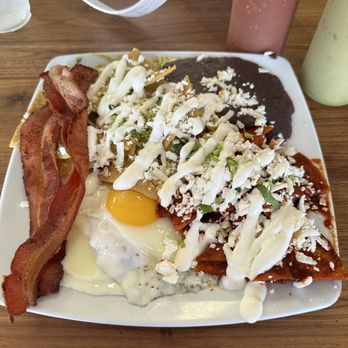 B AM Cocina - Chilaquiles divorciados with a side of bacon - Breakfast & Brunch Near Me - Stafford, Texas