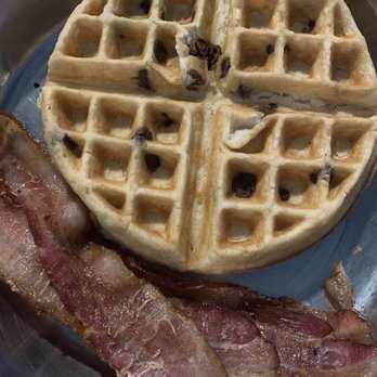 Old Neighborhood Pub - Chocolate chip waffle with side of bacon - Bars Near Me - Cedar Rapids, Iowa Old Neighborhood Pub - Chocolate chip waffle with side of bacon - Bars Near Me - Cedar Rapids, Iowa