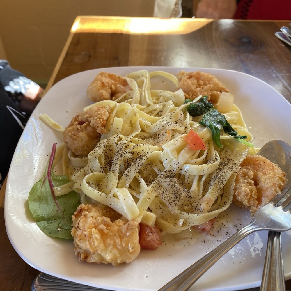 Backyard Bistro - SHRIMP PASTA: four lightly coated & fried shrimp served with tender pasta in a lemon butter sauce - American Near Me - Pipe Creek, Texas