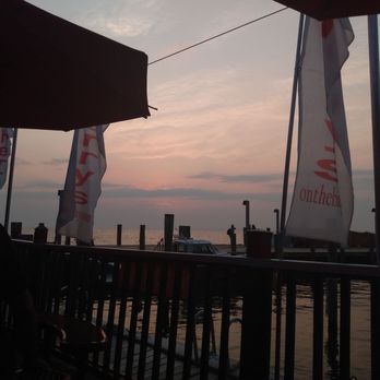Cherry's On the Bay - a sunset over the water - Gay Bars Near Me - Cherry Grove, New York