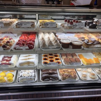 Nitin Bakery - a variety of pastries in a display case - Bakeries Near Me - Miami, Florida