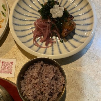O'Kims - CONFIT PORK BELLY BRULEE $20.95 Confit pork belly with miso sauce, apple ginger jam, sesame leaves, purple rice, green salad, and kimchi. - Korean Near Me - Honolulu, Hawaii