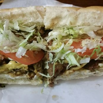Peppi's - Hamburger, sausage and egg burger! Glad I didn't order cajun fries. The sandwich was huge! - Burgers Near Me - Pittsburgh, Pennsylvania