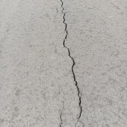 Capital Asphalt - large cracking up middle