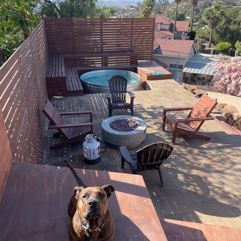 Bello's Landscaping - The finished product- our outdoor deck with3-tiered "stadium seats" for outdoor movies and a wraparound deck for our stock tank pool - Landscaping Near Me - Vista, California