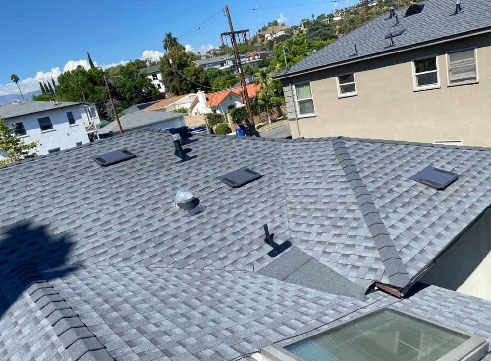 Slide of TopStamp Roofing