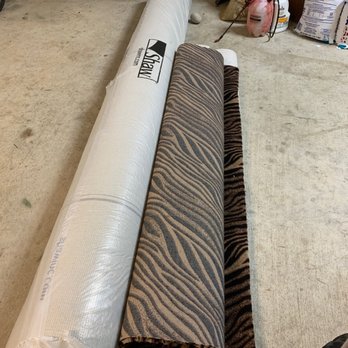 Coco's Floor Covering - two rolls of fabric on the floor - Carpeting Near Me - Baton Rouge, Louisiana