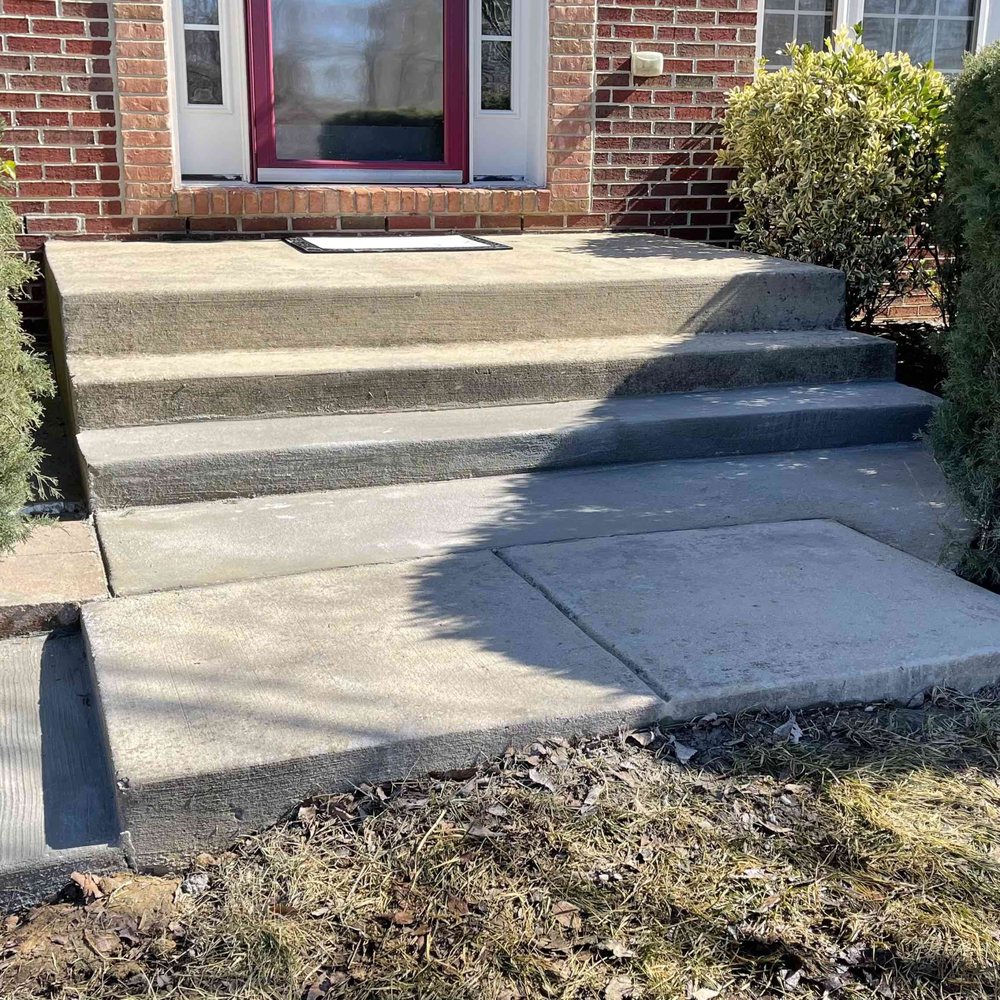 Samira Construction - Front porch. Added a step, concrete landing and a smaller step on the left. - Masonry/Concrete Near Me - Jacksonville , Florida Samira Construction - Front porch. Added a step, concrete landing and a smaller step on the left. - Masonry/Concrete Near Me - Jacksonville , Florida
