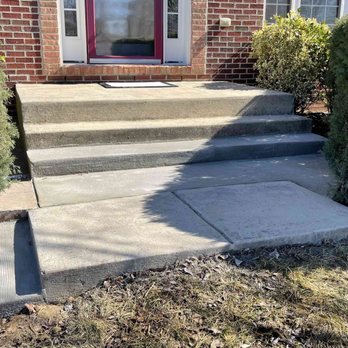 Samira Construction - Front porch. Added a step, concrete landing and a smaller step on the left. - Masonry/Concrete Near Me - Jacksonville , Florida