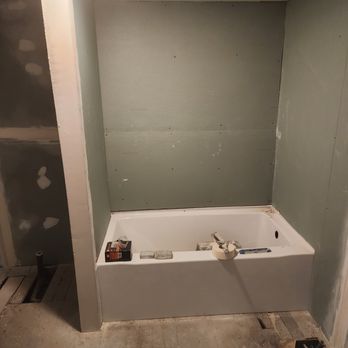 Harvey Home Improvements - a bathtub in a bathroom being remodeled - General Contractors Near Me Harvey Home Improvements - a bathtub in a bathroom being remodeled - General Contractors Near Me