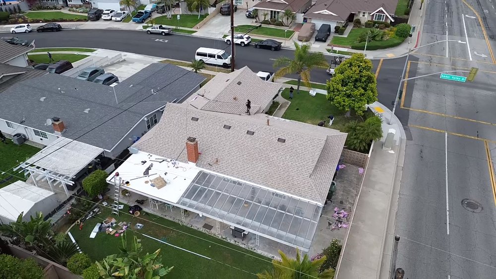 Slide of Sandoval Roofing