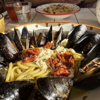 Elvira - Mussels dish with the carbonara in the back. - Italian Near Me - San Diego, California Elvira - Mussels dish with the carbonara in the back. - Italian Near Me - San Diego, California
