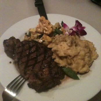 M.A.C. 24/7 - Grilled ribeye steak, fried Maui onion, creme fraiche garlic mashed potatoes, island veg - American Near Me - Honolulu, Hawaii M.A.C. 24/7 - Grilled ribeye steak, fried Maui onion, creme fraiche garlic mashed potatoes, island veg - American Near Me - Honolulu, Hawaii