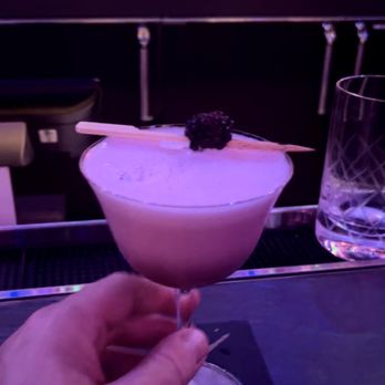 Here Kitty Kitty - Gorgeous drink made with Pisco, blackberries, lemon and egg white. Delicious and labor intensive to make. - Speakeasies Near Me - Las Vegas, Nevada