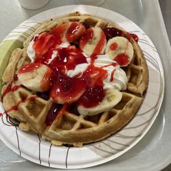 Sturdy Memorial Hospital - Belgian waffle with fresh strawberries and bananas and whipped cream in their cafeteria like 395