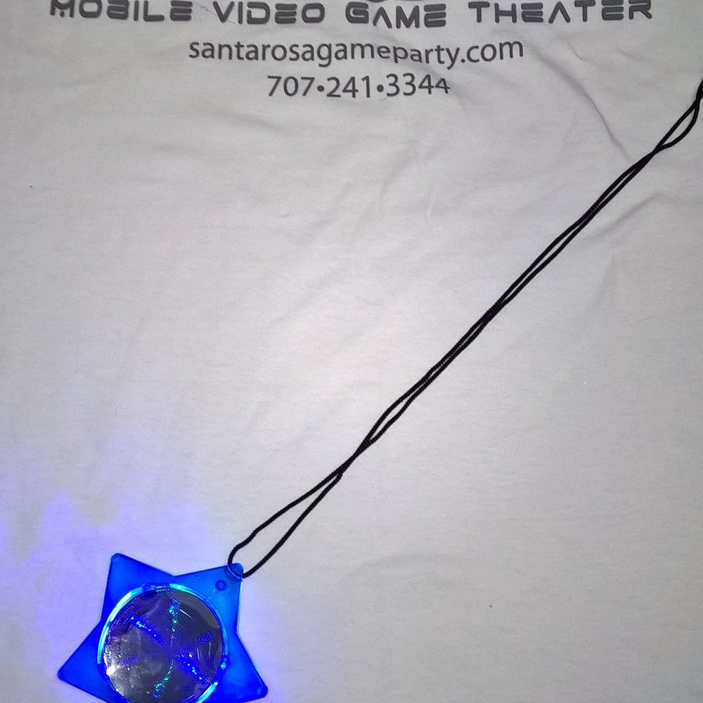Rolling Video Games - Bday boy receives t-shirt & a flashing star on his special day! - Game Truck Rental Near Me Rolling Video Games - Bday boy receives t-shirt & a flashing star on his special day! - Game Truck Rental Near Me