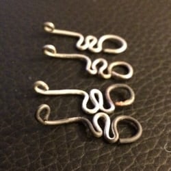 Bedrock Supply - These are silver tadpoles that will be hooked together to make chains.