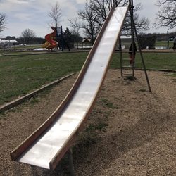 Lyons Club Park - Haven't seen a slide like this since I was a kid. You haven't lived until you've scalded yourself on a metal slide.