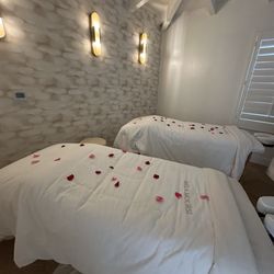 Couples massage in a private room.