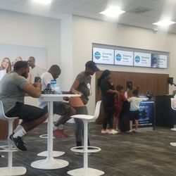 Spectrum - There is only one person working. The line and the wait is long.