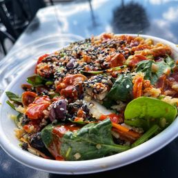 Seoul bowl, With spicy bibimbap sauce**, sesame seeds, korean chile cashew dressing. It's vegan!
