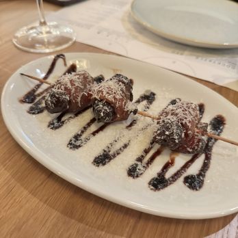 Sixty Vines - Bacon wrapped dates - New American Near Me - Reston, Virginia Sixty Vines - Bacon wrapped dates - New American Near Me - Reston, Virginia