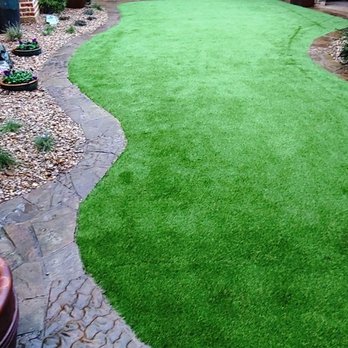 BIMO landscaping - a green lawn in a backyard - Landscaping Near Me BIMO landscaping - a green lawn in a backyard - Landscaping Near Me