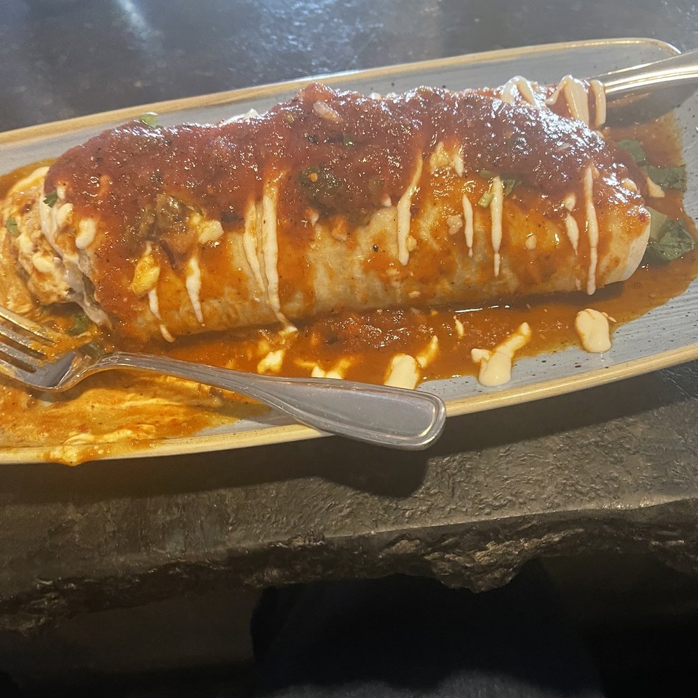 CIELO Mexican Restaurant - California burrito with some house salsa on California Burrito. So good. - Mexican Near Me - San Angelo, Texas