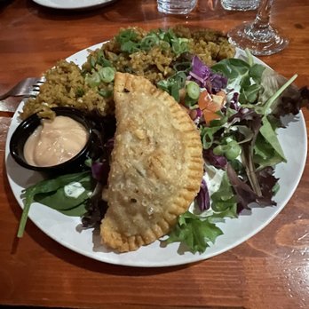 Lola's Lounge - Arroz vago, empanada, side salad - Spanish Near Me - Sacramento, California Lola's Lounge - Arroz vago, empanada, side salad - Spanish Near Me - Sacramento, California