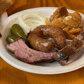 Black's Barbecue Lockhart - Pork Baby Back Ribs & jalapeño Sausage Ring - Barbeque Near Me - Lockhart, Texas