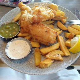 Fish and chips with a side of mushy peas