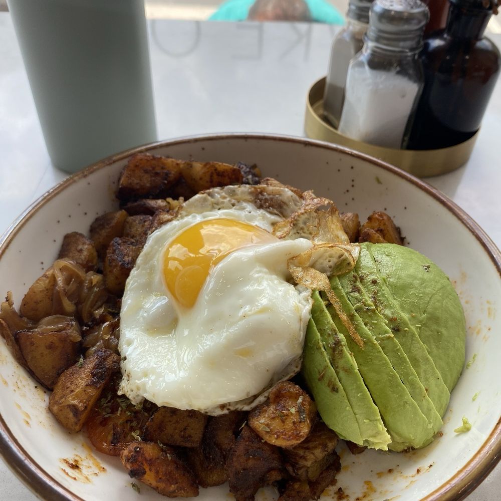 Gussy's Cafe - Home fries with eggs and a side of avocado - Breakfast & Brunch Near Me - Jersey City, New Jersey Gussy's Cafe - Home fries with eggs and a side of avocado - Breakfast & Brunch Near Me - Jersey City, New Jersey
