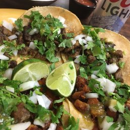Tacos de fajita and tacos al pastor....all really really good! AND THE BEER IS FREE (I had 2, tipped them nicely). Tacos de fajita and tacos al pastor....all really really good! AND THE BEER IS FREE (I had 2, tipped them nicely).