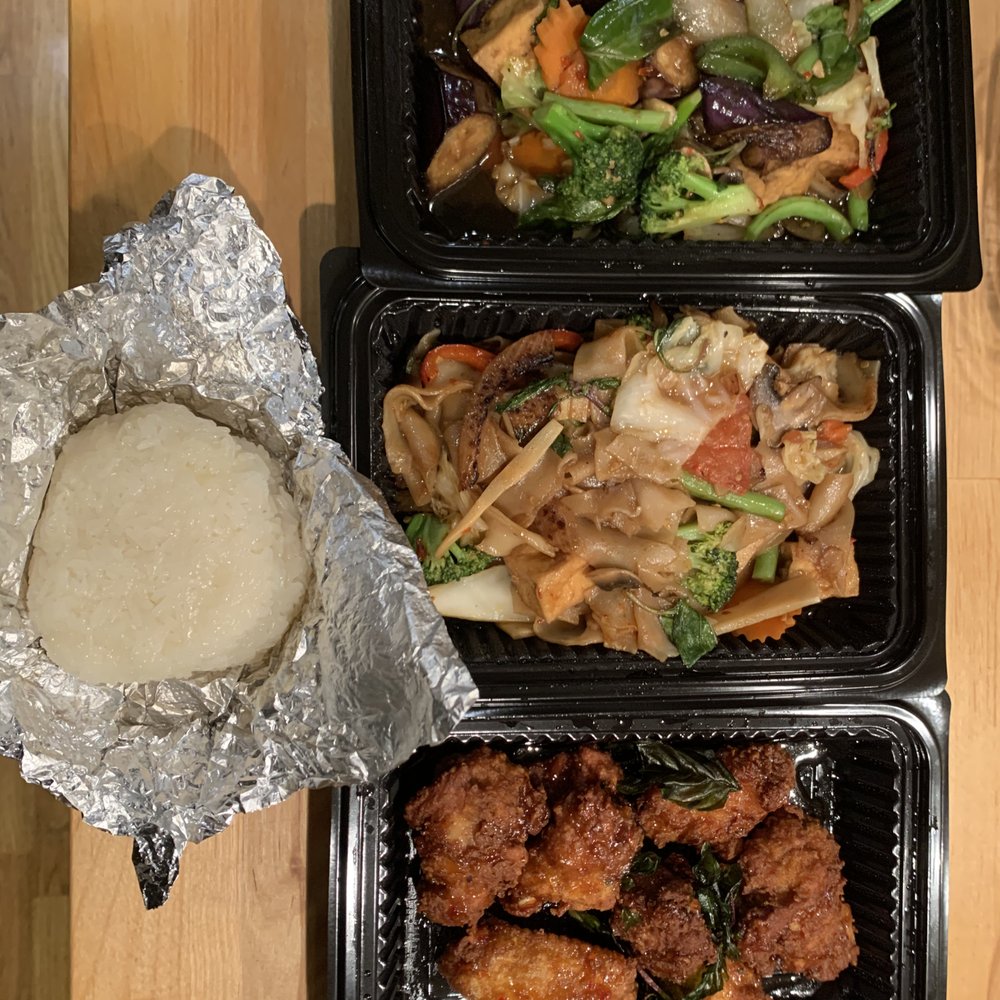 Sticky Rice Cafe - (clockwise from top right) Spicy Eggplant with tofu and veggies, Drunken Noodles with tofu and veggies, Chicken Wings, Sticky Rice - Thai Near Me - Oakland, California Sticky Rice Cafe - (clockwise from top right) Spicy Eggplant with tofu and veggies, Drunken Noodles with tofu and veggies, Chicken Wings, Sticky Rice - Thai Near Me - Oakland, California