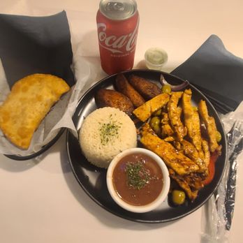 El Punto Cubano - Grilled chicken with rice, red beans, chicken empanada on the side. Coke. - Cuban Near Me - Brooklyn, New York El Punto Cubano - Grilled chicken with rice, red beans, chicken empanada on the side. Coke. - Cuban Near Me - Brooklyn, New York