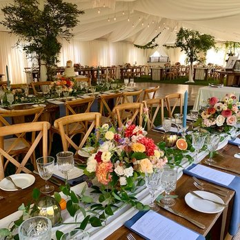 Mendocino Floral Design - Table layout in the tent at the MacCallum House. - Florists Near Me - Mendocino, California Mendocino Floral Design - Table layout in the tent at the MacCallum House. - Florists Near Me - Mendocino, California