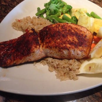 BJ's Restaurant & Brewhouse - Photo by Cristina... Blackened salmon over rice and vegetables - New American Near Me - Frederick, Maryland