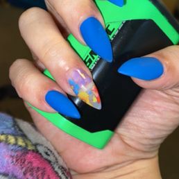Medium stiletto nails with blue matte finish!