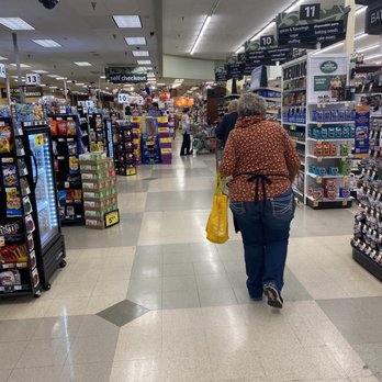 King Soopers - a woman walking down a grocery aisle - Drugstores Near Me - Loveland, Colorado King Soopers - a woman walking down a grocery aisle - Drugstores Near Me - Loveland, Colorado