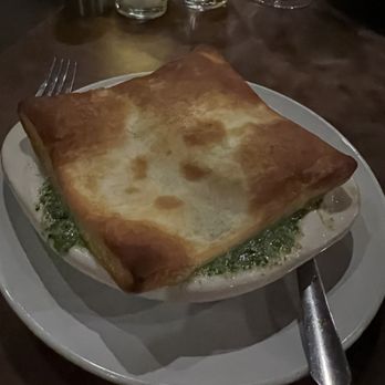 Le Garage - Herbal and garlicky escargot with a puff pastry lid. - French Near Me - Sausalito, California Le Garage - Herbal and garlicky escargot with a puff pastry lid. - French Near Me - Sausalito, California