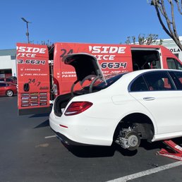 Car tire being repaired by GI Services Car tire being repaired by GI Services