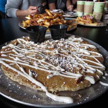 Oy! - Cinna-Yum Extreme 12" Buttermilk Pancake ($10.97). Cinnamon & pecan stuffed pancake, cream cheese icing, chopped pecans. - Breakfast & Brunch Near Me - Atlanta, Georgia Oy! - Cinna-Yum Extreme 12" Buttermilk Pancake ($10.97). Cinnamon & pecan stuffed pancake, cream cheese icing, chopped pecans. - Breakfast & Brunch Near Me - Atlanta, Georgia