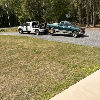 Preferred Towing And Recovery - This is him hooking up our vehicle to have it towed to have some fabrication work done on the chassis - Towing Near Me - Powhatan, Virginia Preferred Towing And Recovery - This is him hooking up our vehicle to have it towed to have some fabrication work done on the chassis - Towing Near Me - Powhatan, Virginia