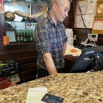 New China Buffet - Smiling as he changed my receipt and charged full price for me - Chinese Near Me - Newport, Kentucky