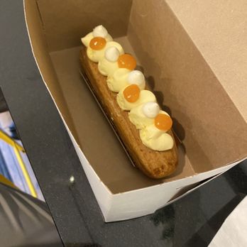 Petit Chou - Passion Fruit Eclair - Bakeries Near Me - New York, New York Petit Chou - Passion Fruit Eclair - Bakeries Near Me - New York, New York