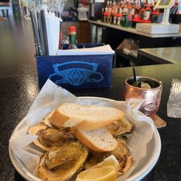 Charbroiled oysters and an EZ mule Charbroiled oysters and an EZ mule